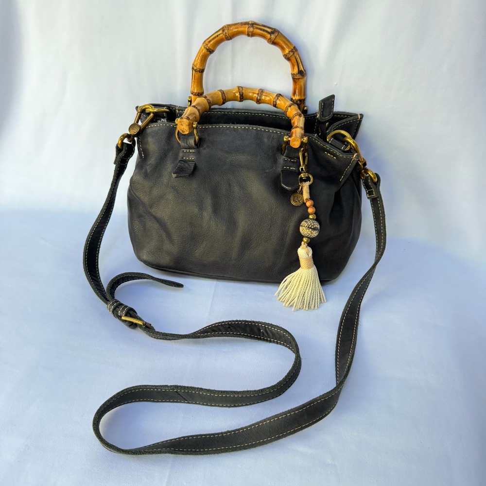 The Sak Black Leather Women's Crossbody Handbag Charm Tassel Bamboo Top Handle